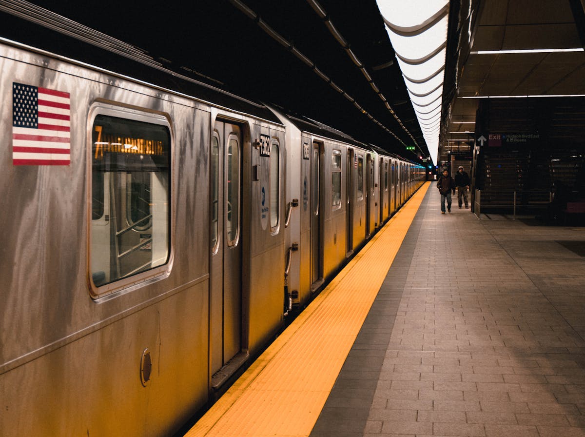 New York City subway platform with passengers waiting